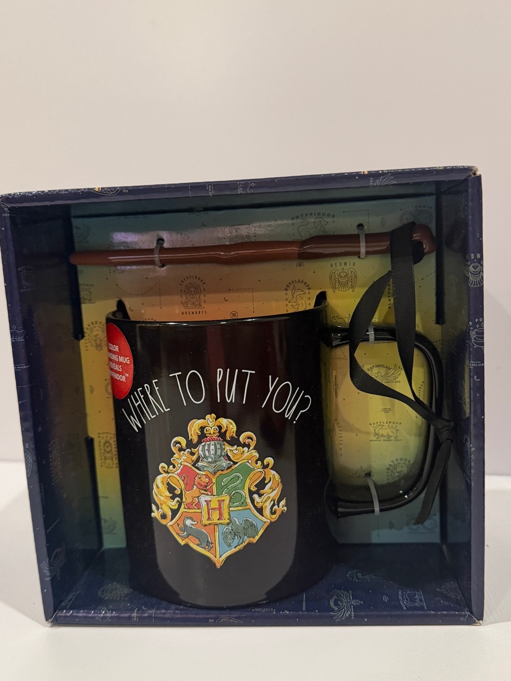 Harry Potter mug and wand-style stirrer set in its original gift box.